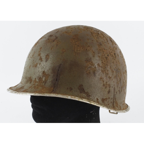 713 - WW2 US M1 Fixed Bale Helmet with insignia of the 82nd Airborne 504th (PIR).