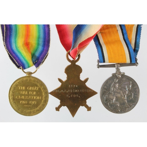 726 - 1915 Star Trio (1374 Pte H E Richardson R.Fus) served 10th Bn. Note: BWM engraved.  (3)  sold as see... 