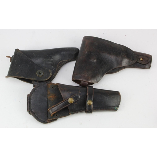 73 - Leather Pistol holsters, 2x American and one other (3)