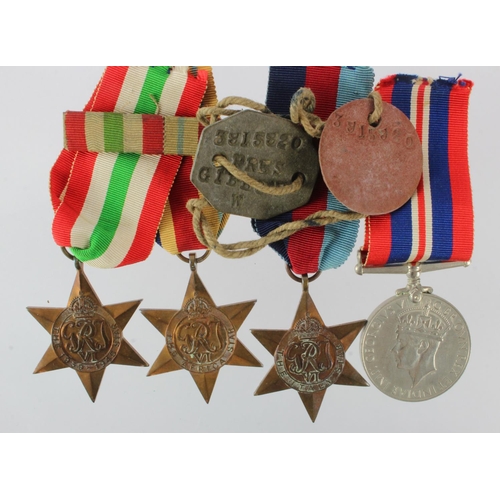 952 - WW2 group - 1939-45 Star, Africa Star, Italy Star, War Medal, ID Tags and a Forces Letter attributed... 