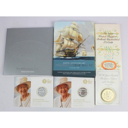 596 - GB Royal Mint presentation packs (6): 1989 £2 pair, 'Millennium Coin', Nelson £5 pair, 1990 £5, and ... 