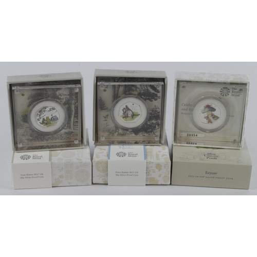 606 - GB Royal Mint silver proof 50p colour coins in display blocks (6): 2017 Beatrix Potter: Peter Rabbit... 