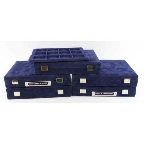 782 - Five blue velvet coin boxes, various designs to inner lids. AF but all noted as good condition