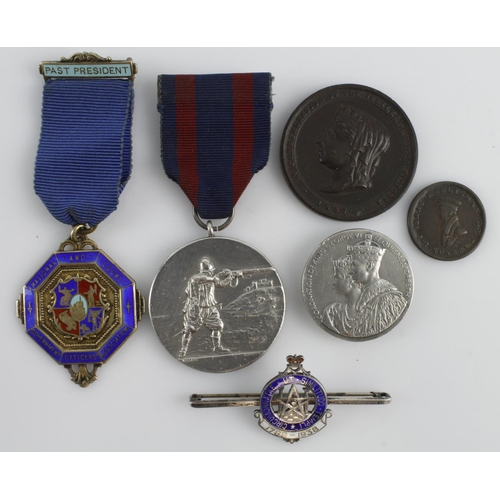 817 - Mixed lot of medals (3) badges (2) and 1x token - 4 items are silver 3 of which bear silver marks an... 