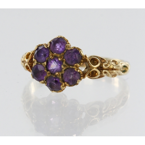 102 - 9ct yellow gold amethyst cluster ring, seven round amethysts approx. 3mm each, head width 10mm, fing... 