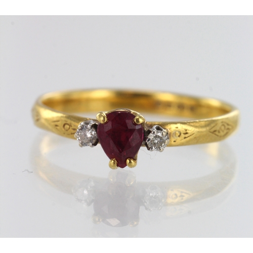 191 - 22ct yellow gold diamond and ruby trilogy ring, one pear shaped ruby measuring 5.4mm x 4mm, two roun... 