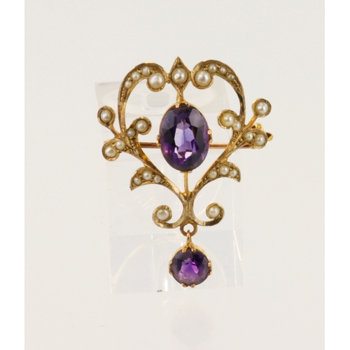 393 - Yellow gold (tests 9ct) amethyst and seed pearl lavalier brooch, principle amethyst measures 10mm x ... 