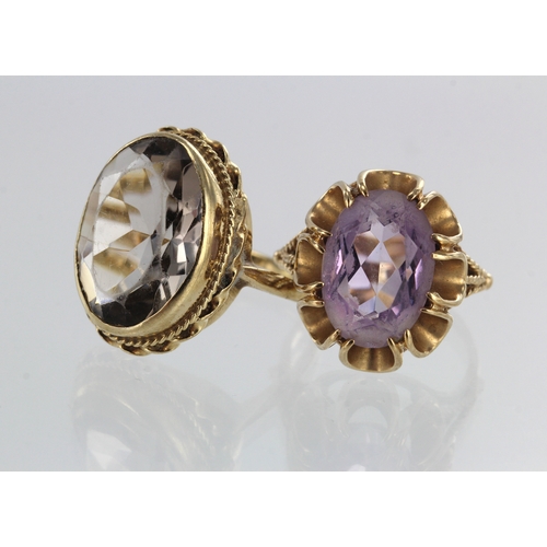 395 - Two 9ct gold cocktail rings, to include one amethyst measuring 14mm x 10mm, finger size K/L, one smo... 