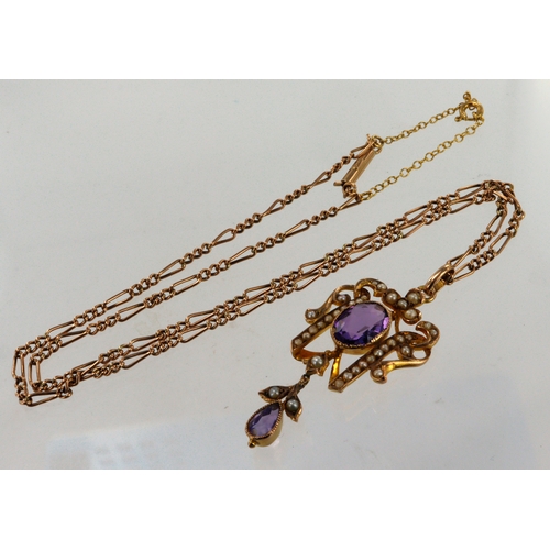 406 - Yellow gold (tests 9ct) vintage lavalier pendant and chain, pendant set with amethyst and seedpearls... 