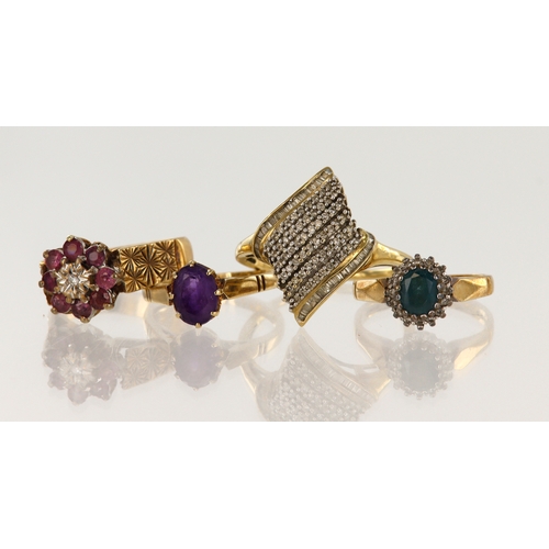 412 - Four 9ct yellow gold rings, stones include diamond, ruby, blue topaz and amethyst, finger sizes L/Mx... 