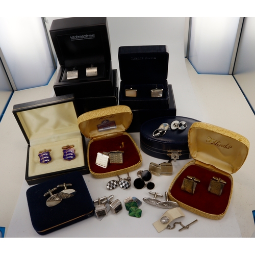 502 - Twelve pairs of silver cufflinks, stones include black diamonds, diamonds, onyx, mother of pearl, en... 