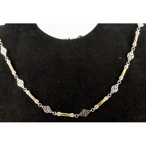 506 - 9ct yellow and white gold Celtic necklace, length 16.5