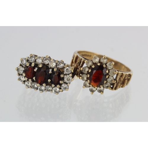 507 - Two 9ct gold dress rings, stones include garnet, CZ, paste, finger sizes Q/R, T, total weight 9.3g.