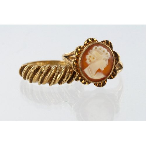 588 - Two 9ct yellow gold rings, carved shell cameo finger size N. Abstract domed ring finger size O/P. To... 