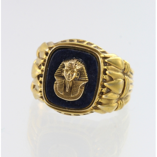 61 - 14ct yellow gold Pharoah signet ring, set with a sodalite cushion shaped table measuring 14mm x 12mm... 