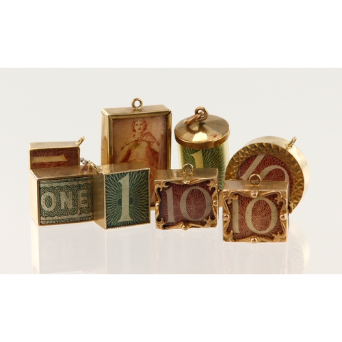 626 - Eight 9ct gold vintage 'in case of emergency break glass' charms, holding either one pounds or ten s... 