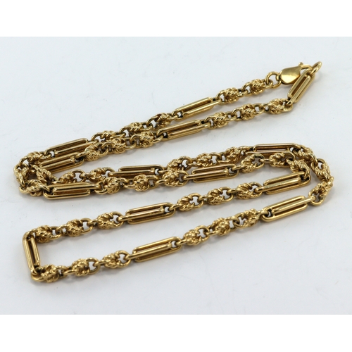 637 - 9ct yellow gold knot and fetter linked chain, width approx. 4.7mm, length 24