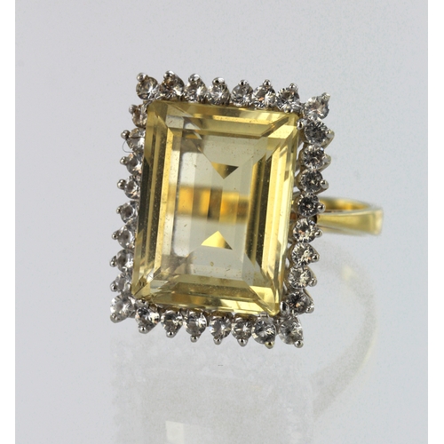 69 - Yellow gold (tests 18ct) citrine and CZ cluster ring, step cut citrine measures approx. 16mm x 12mm,... 