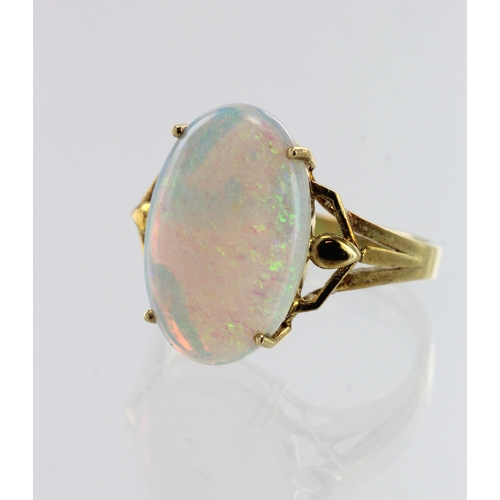 84 - Yellow gold (tests 14ct) opal dress ring, one oval cabochon opal approx. 4ct measures 18mm x 12mm, f... 