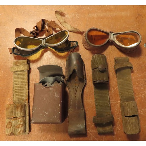 689 - WW2 box of assorted goggles bayonet frogs etc.