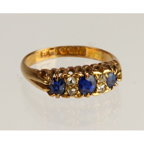 133 - 18ct yellow gold antique diamond and sapphire ring, three graduated sapphires principle measures 4mm... 