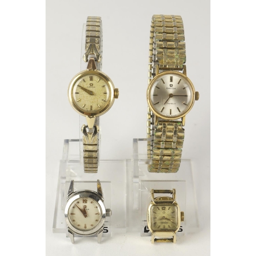 105 - Omega. Four ladies manual wind wristwatches, three gold plated one stainless steel, two on expandabl... 