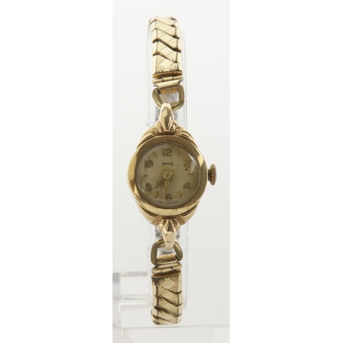 169 - Ladies 9ct cased Smiths manual wind wristwatch, hallmarked Birmingham 1960. The creamed dial with gi... 