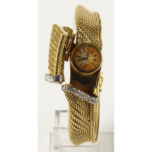 188 - Omega 18ct cased diamond set bracelet watch. Of milanese link ribbon design, set with 16 brilliant-c... 