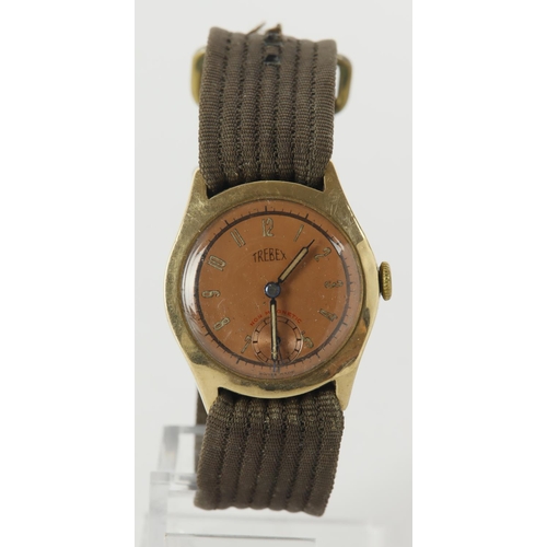 21 - Gents 9ct cased Trebex wristwatch, hallmarked Edinburgh 1945. The copper coloured dial with arabic n... 