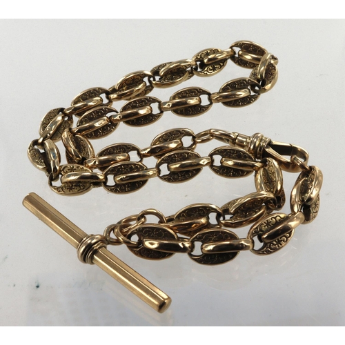 308 - Yellow gold (tests 9ct) vintage Albert pocket watch chain, engraved fancy links, hexagonal T-bar wit... 