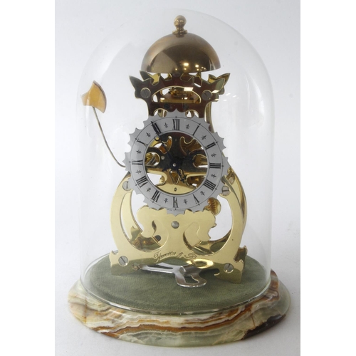 311 - Skeleton clock by Thwaites & Reed, on a marble base with glass dome, ticks but not chiming, dome hei... 