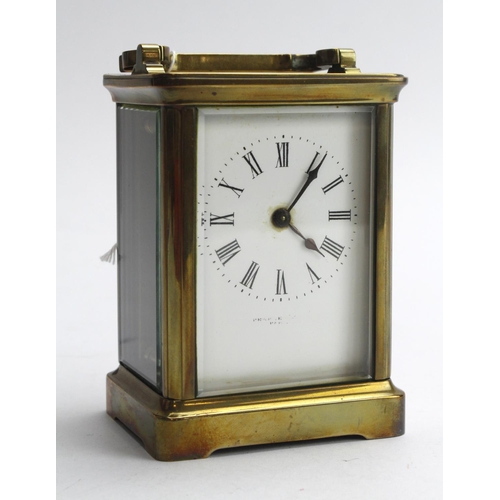 322 - Brass five glass carriage clock, white enamel dial with Roman numerals, with makers name beneath (ru... 