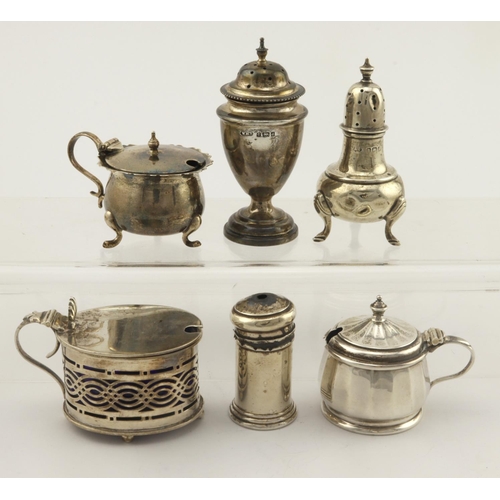 442 - Three silver mustard pots and three silver pepper pots  (The lot includes four blue glass liners)   ... 