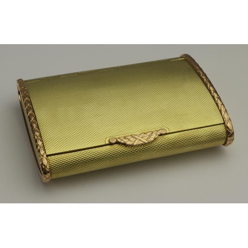 477 - 18ct gold cigarette case by Cartier, hallmarked Jacques Cartier London 1933. The engine turned round... 