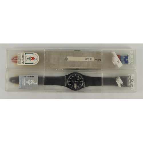 61 - Swatch. Two gents quartz wristwatches complete in plastic cases. One Atlanta 1996 olympic games desi... 