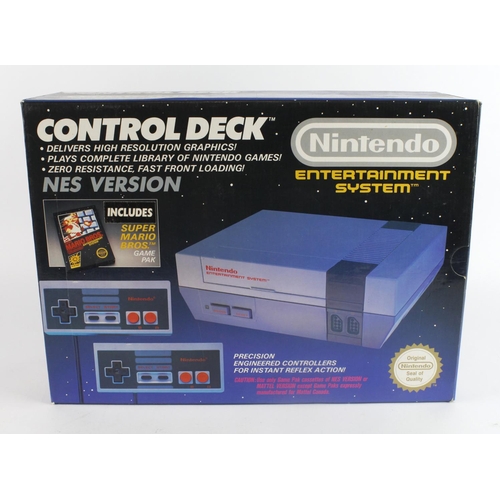 311 - Nintendo Entertainment System (NES) Control Deck, instructions present, missing Mario Bros. game pak... 