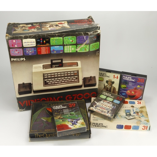 318 - Philips Videopac G7000 games console, contained in original box, together with six boxed games