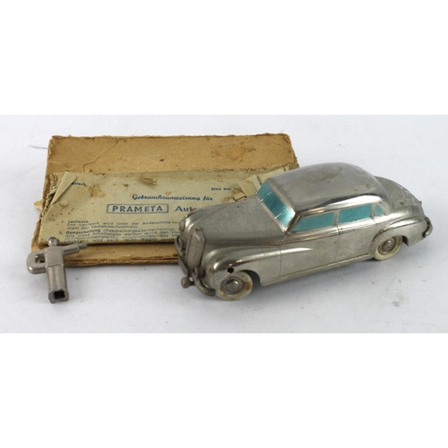 320 - Prameta Kolner Mercedes Benz 300 diecast clockwork model, with original key and damaged box (motor w... 