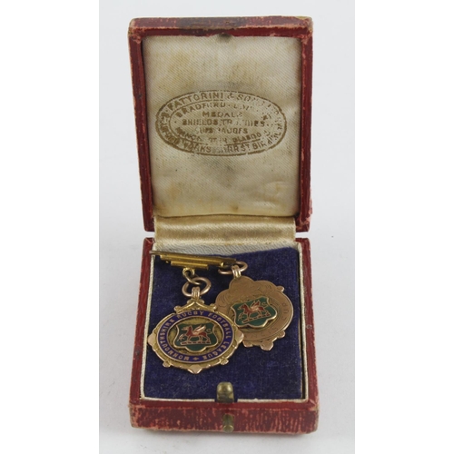 545 - Sporting interest. Two 9ct Gold and enamel R.F.C. fob medals, circa 1930s, both engraved to reverse ... 