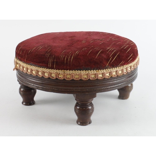 553 - Victorian turned footstool, with upholstered top, height 13cm, diameter 25cm approx.