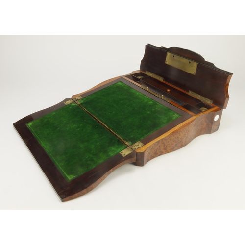 555 - Walnut writing slope with brass and mother of pearl inlaid decoratiion, two glass inkwells, height 9... 