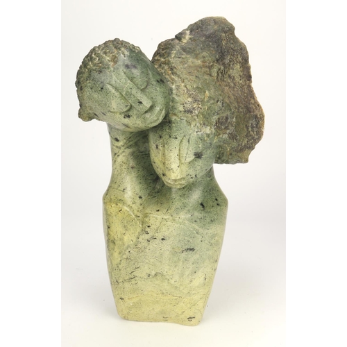 558 - Zimbabwe. Shona brown/green opal serpentine stone sculpture depicting two figures embracing . Signed... 