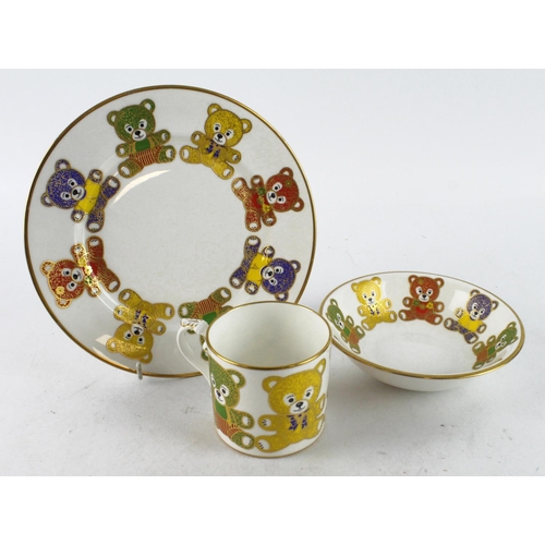 75 - Asprey. A three piece christening set by Asprey London, comprising, cup, bowl & plate, depicting gil... 