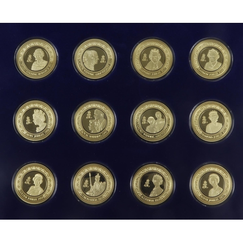 1052 - In Memor. Queen Elizabeth II, set of 12x gilt copper medals, cased with cert by (? - a European issu... 