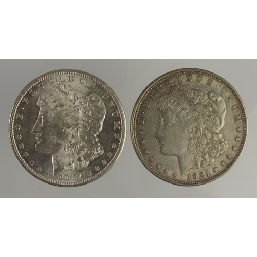 568 - USA Morgan Silver Dollars (2): 1881 S BU, and 1921 EF light scratch.