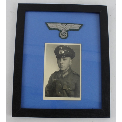 1081 - German Army & Naval portrait photos in frames with breast eagles above.