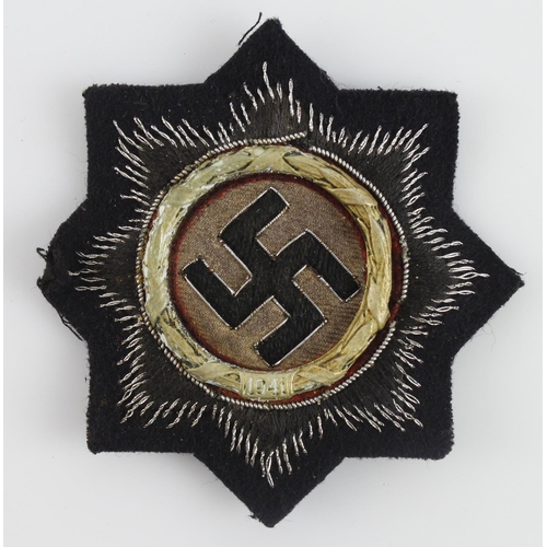 1090 - German Deutches Kreuz in cloth, black Panzer example.