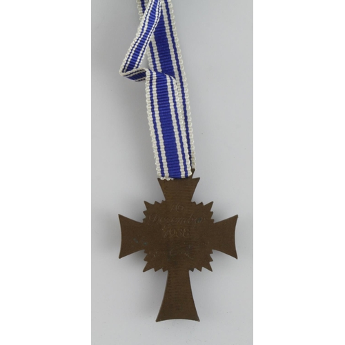 1152 - German Mothers Cross in bronze with award document to Christiana Vogt.