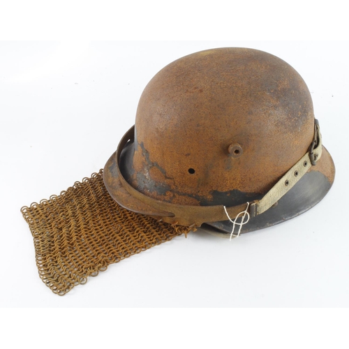 1265 - Imperial German M16 helmet with chain mail splash guard visor mostly worn by machine gunners, extrem... 