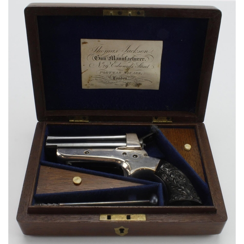 135 - Sharps four barreled breech loading pepperbox pistol, blued barrels 7.5cm, calibre .30 rimfire. Barr... 